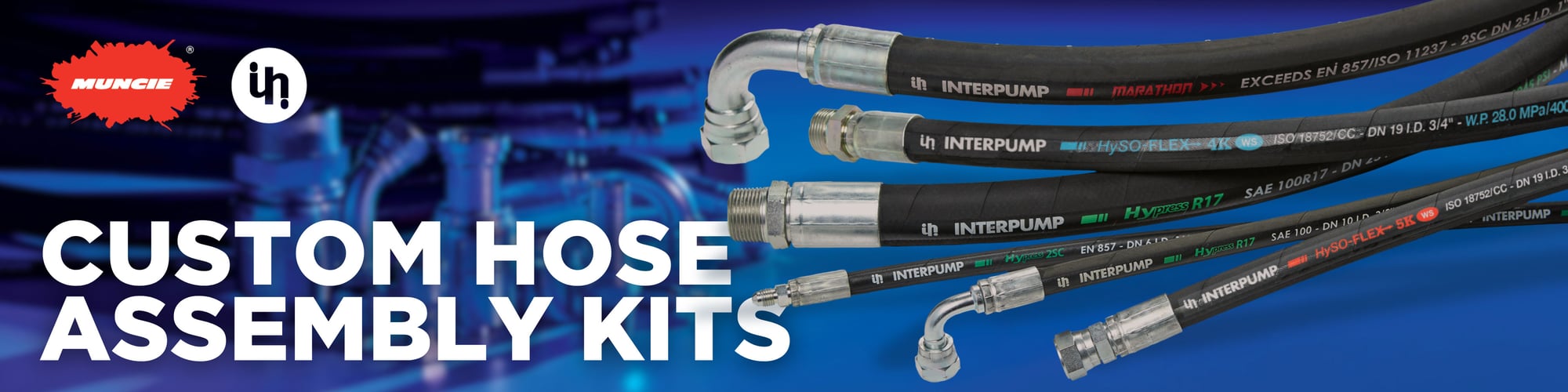 In the background of the image, slightly out of focus, there is a collection of hose assemblies and fittings cast in a blue light. In the foreground, without special colors, there is a collection of hose assemblies coming from the right side of the image. On the left side of the image, in the top left-hand corner, is the Muncie Power Products PowerBurst next to the Interpump Fluid Solutions. Below that, in all caps white letters are the words, "Custom Hose Assembly Kits."